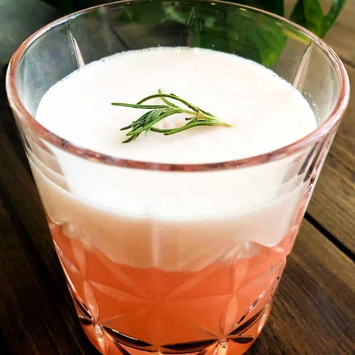 rosemary grapefruit vodka cocktail with rosemary on top