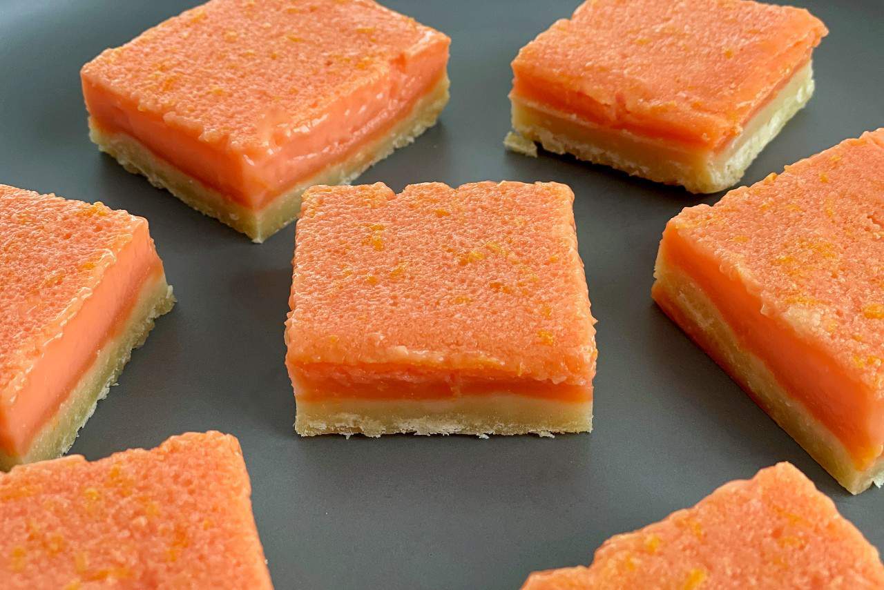 sliced grapefruit bars on a plate.