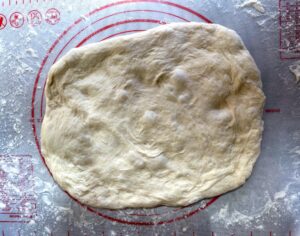 ciabatta dough pressed out into a rectangle