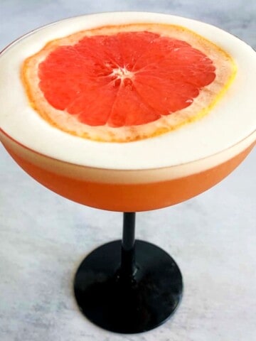 pisco sour with grapefruit juice and foam on top