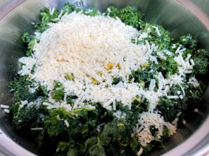 kale salad in a bowl before mixing