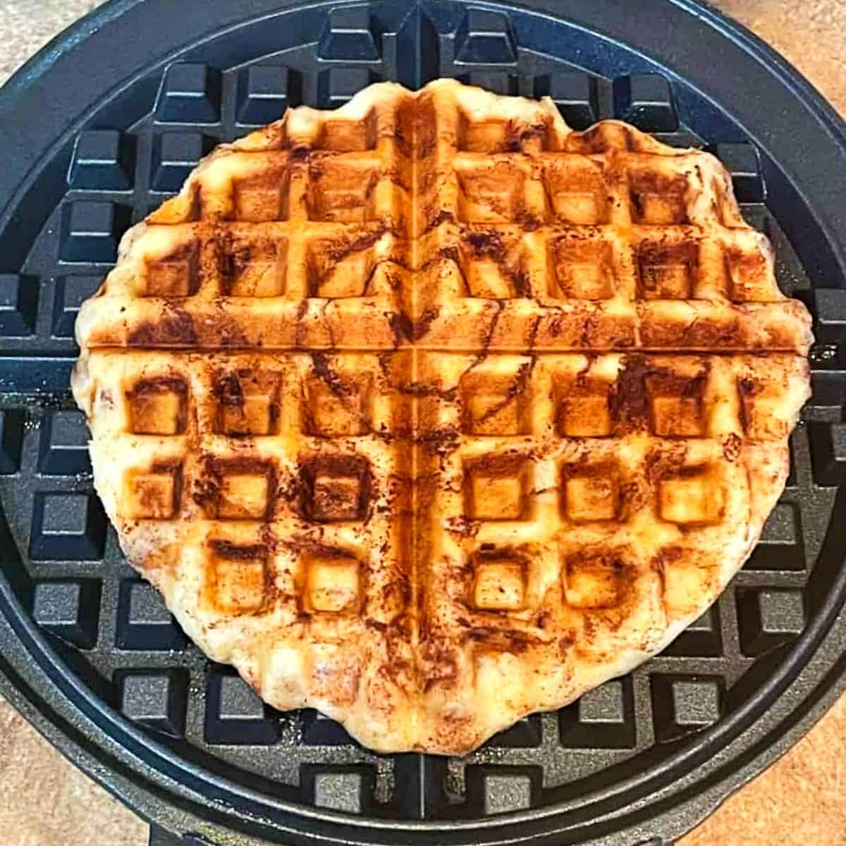 cinnamon-roll-cooked-in-a-waffle-iron