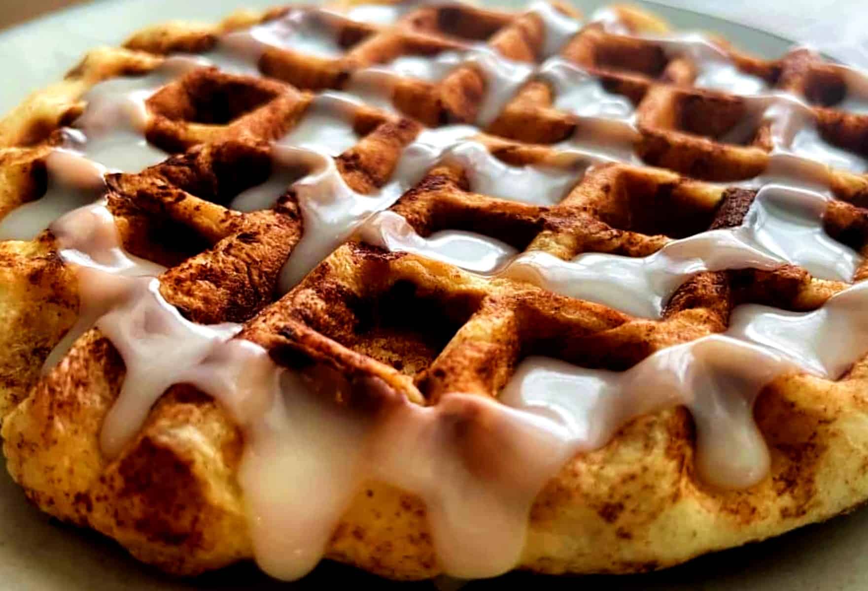 cinnamon-roll-cooked-in-a-waffle-maker-with-frosting-on-top