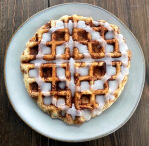 cinnamon roll waffle with frosting