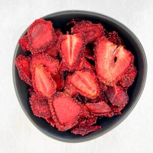 dehydrated strawberries in a small bowl
