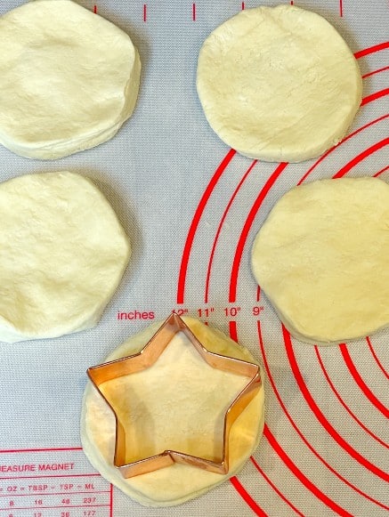 star cookie cutter on canned biscuits
