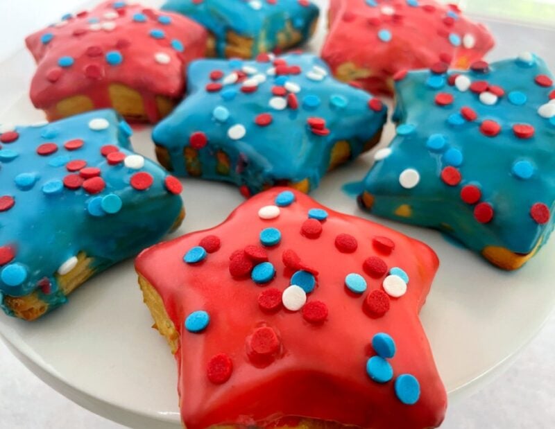 star donuts with red and blue icing and sprinkles