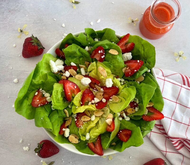 strawberry butter lettuce salad with strawberry dressing on the side