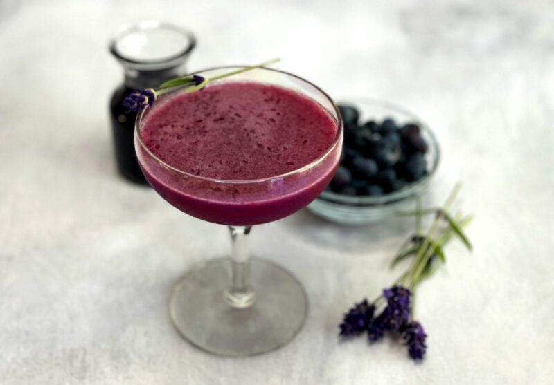 blueberry lavender cocktail with blueberries, lavender and syrup