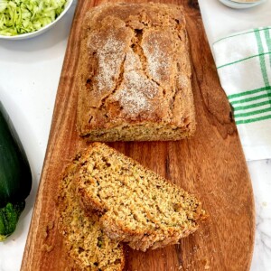 Cinnamon-Zucchini-bread-sliced-on-a-cutting-board