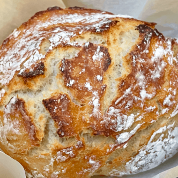 baked no-knead sourdough bread in a dutch oven