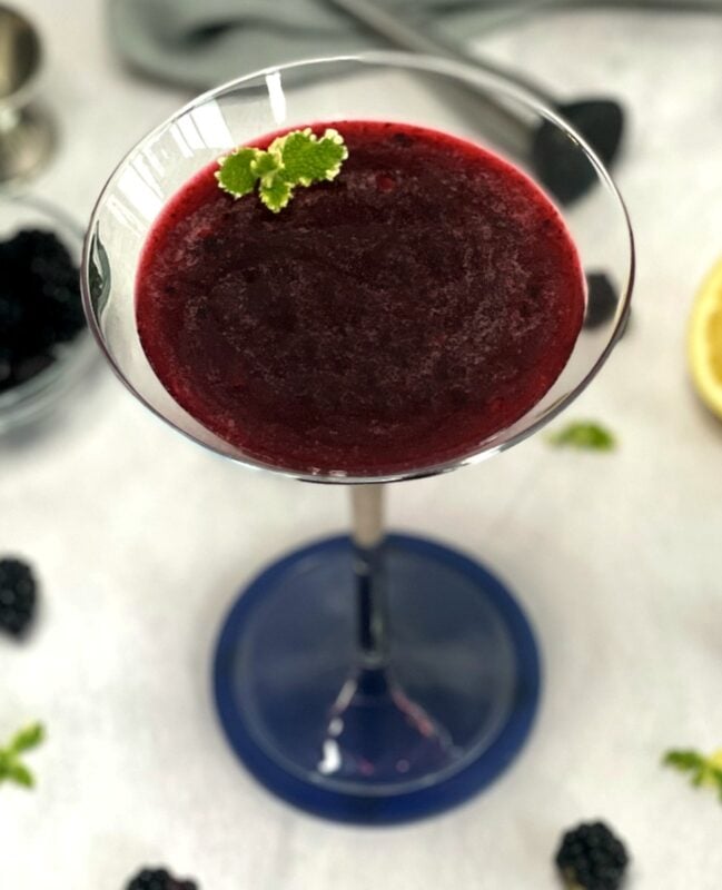 blackberry martini in a martini glass