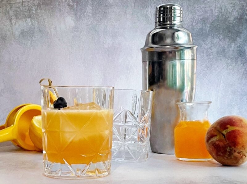 peach whiskey sour and peach syrup