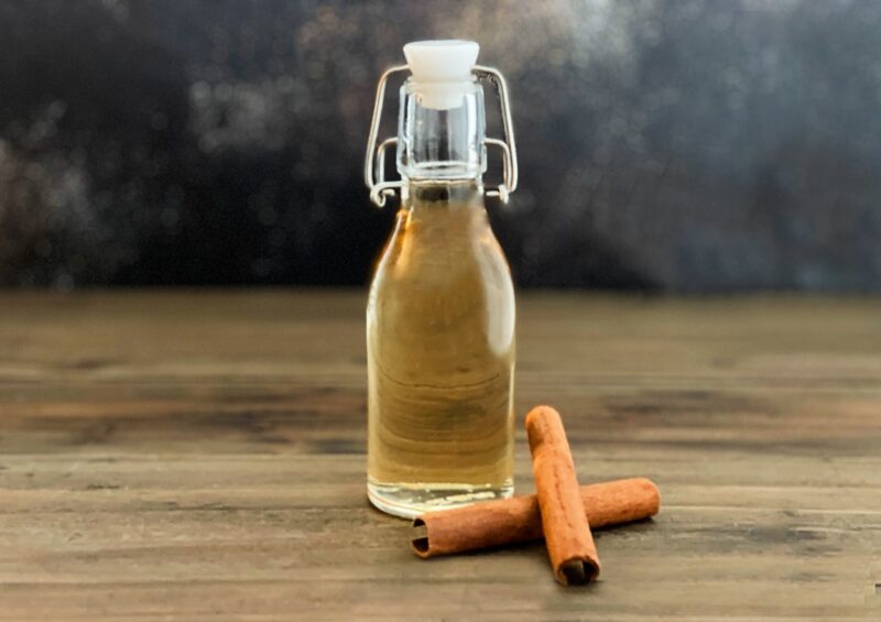 cinnamon syrup in a flip top bottle.