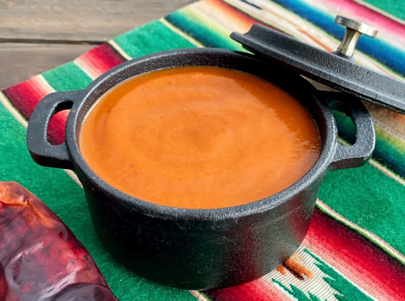homemade enchilada sauce in a black pot