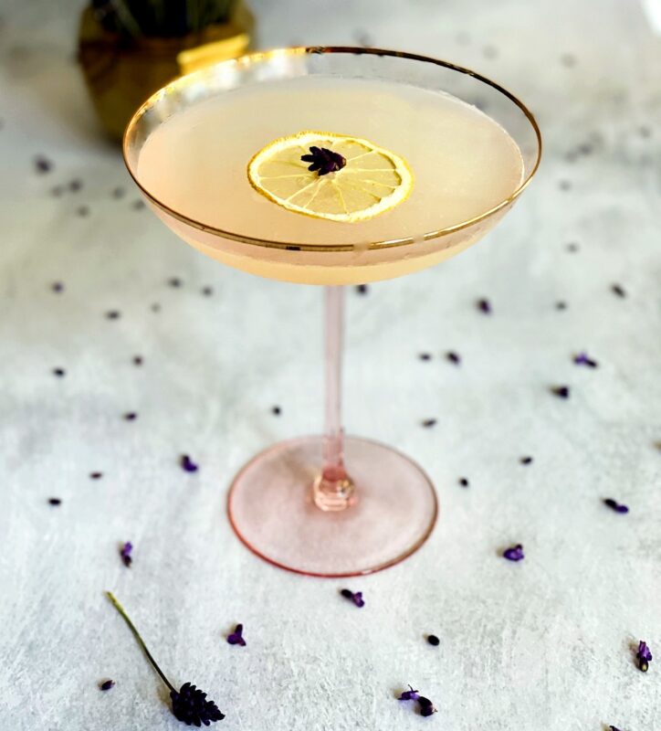 lavender lemon drop with a dehydrated lemon and lavender garnish