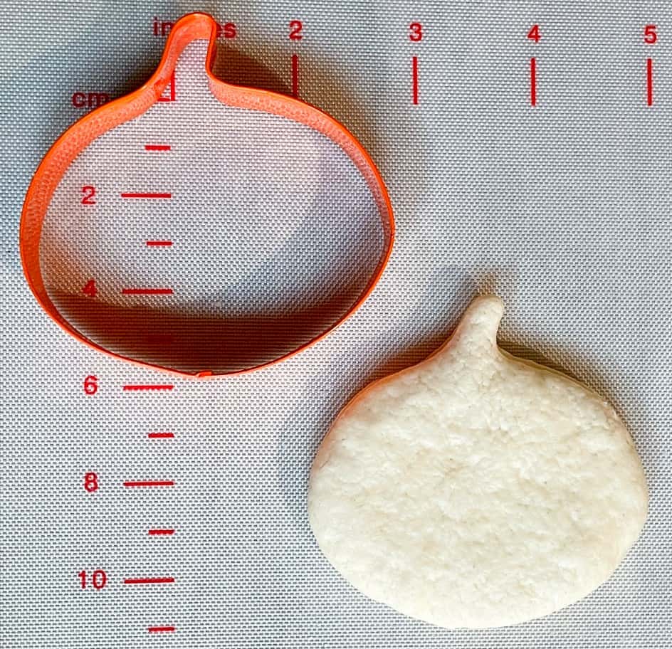 pumpkin cut out of a biscuit