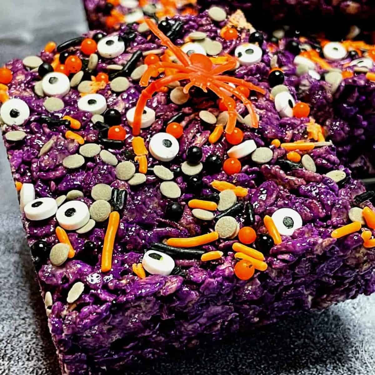 ube-halloween-rice-krispie-treat-with-a-toy-spider-on-top
