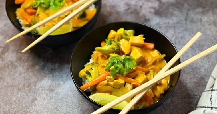 pumpkin curry in a bowl with chopsticks