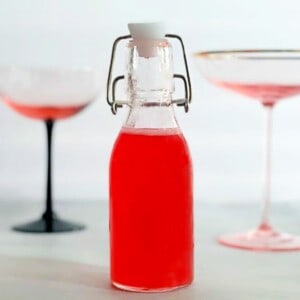 rhubarb syrup in a flip top bottle