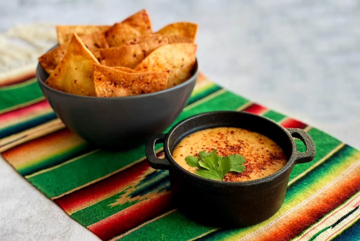 tequila queso fundido with homemade tortilla chips.