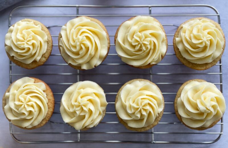 top view of passion fruit cupcakes with passion fruit curd buttercream frosting