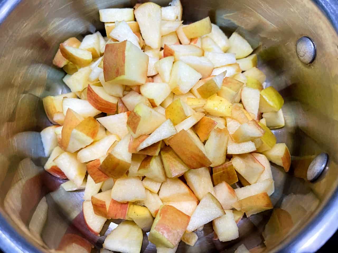 chopped apples in a pan.