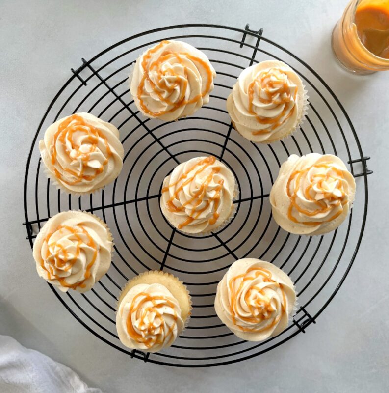 caramel filled cupcakes with caramel on top
