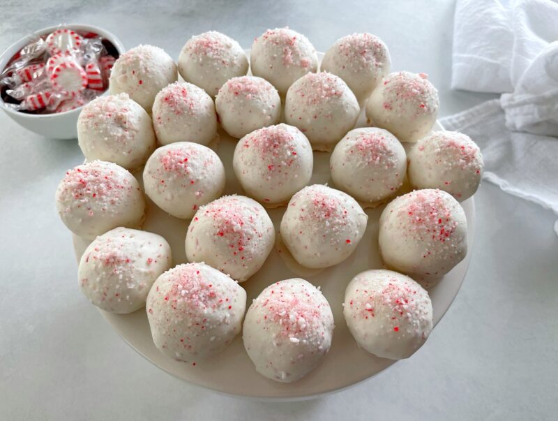 peppermint cake pops on a cake stand