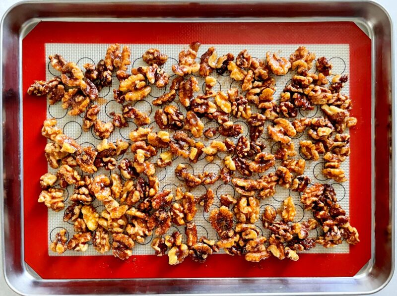 raw walnuts with spices before baking.