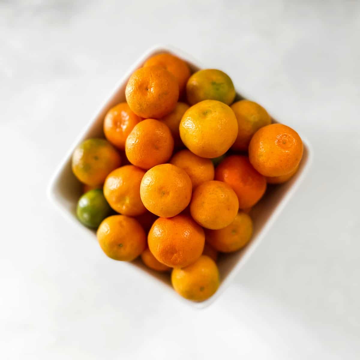 a bowl of ripe calamansi limes.