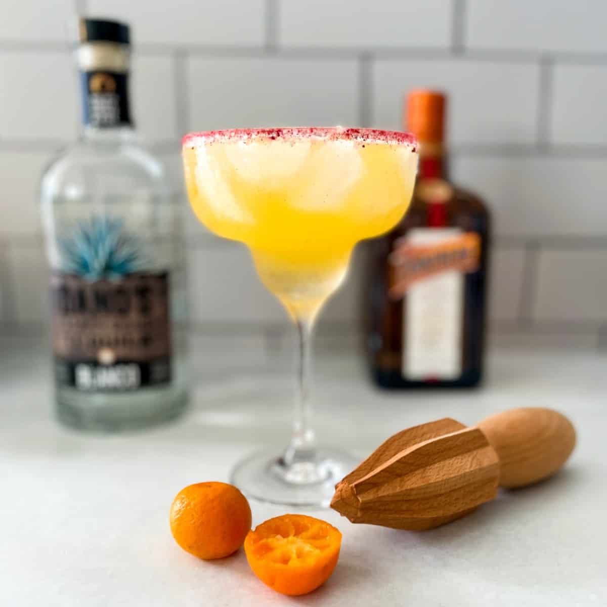 a calamansi margarita, tequila, and orange liqueur