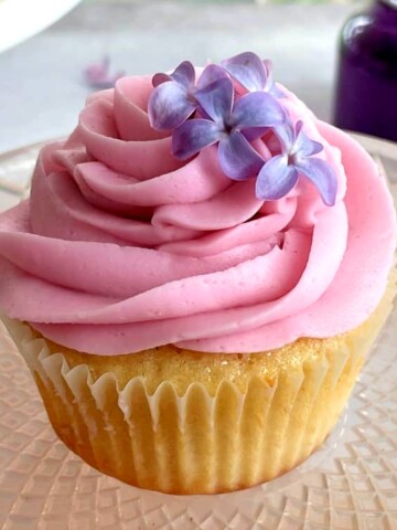 lilac cupcake on a platter