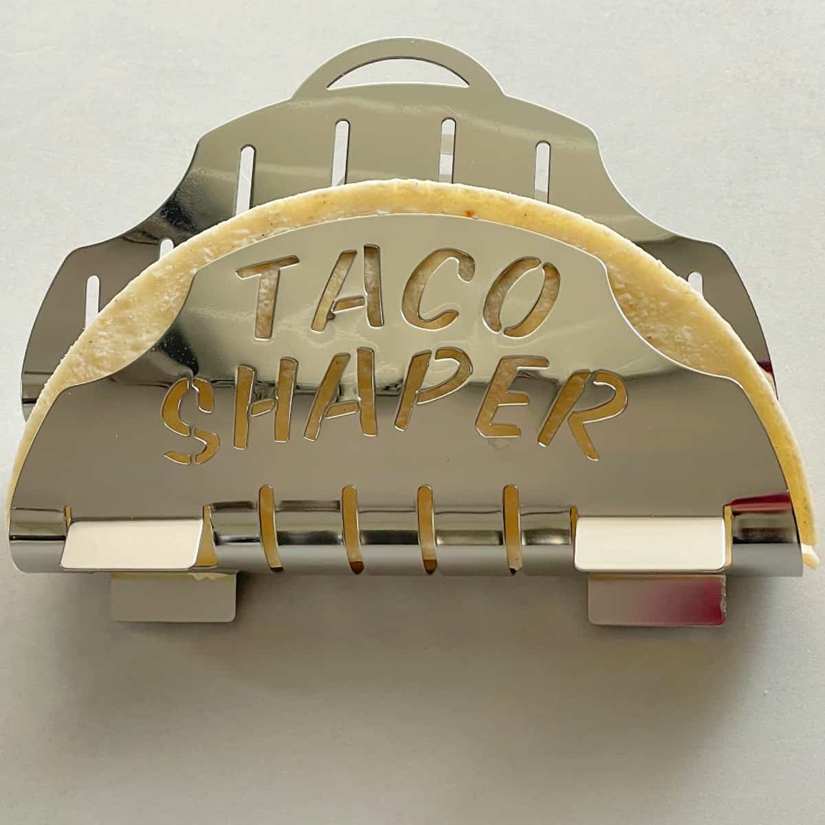 taco shaper with tortilla.