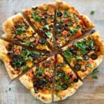 taco pizza cut into triangles.