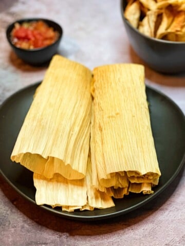 red chili tamales and side dishes.