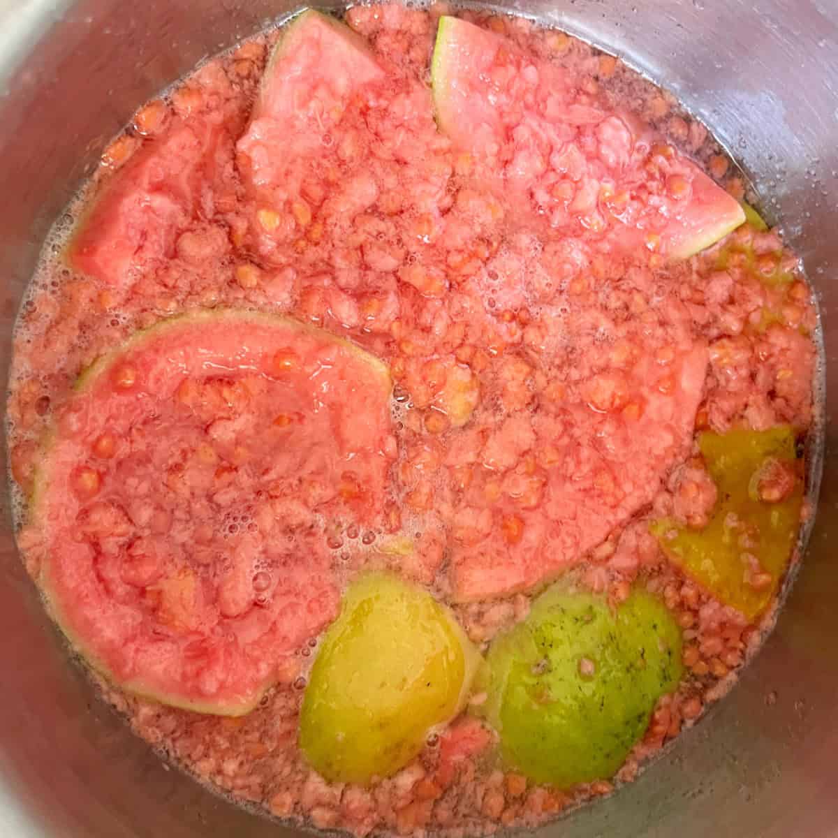 fresh guavas in a pan.