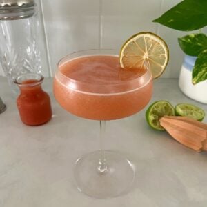 guava daiquiri in a coupe glass.