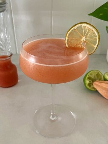 guava daiquiri in a coupe glass.