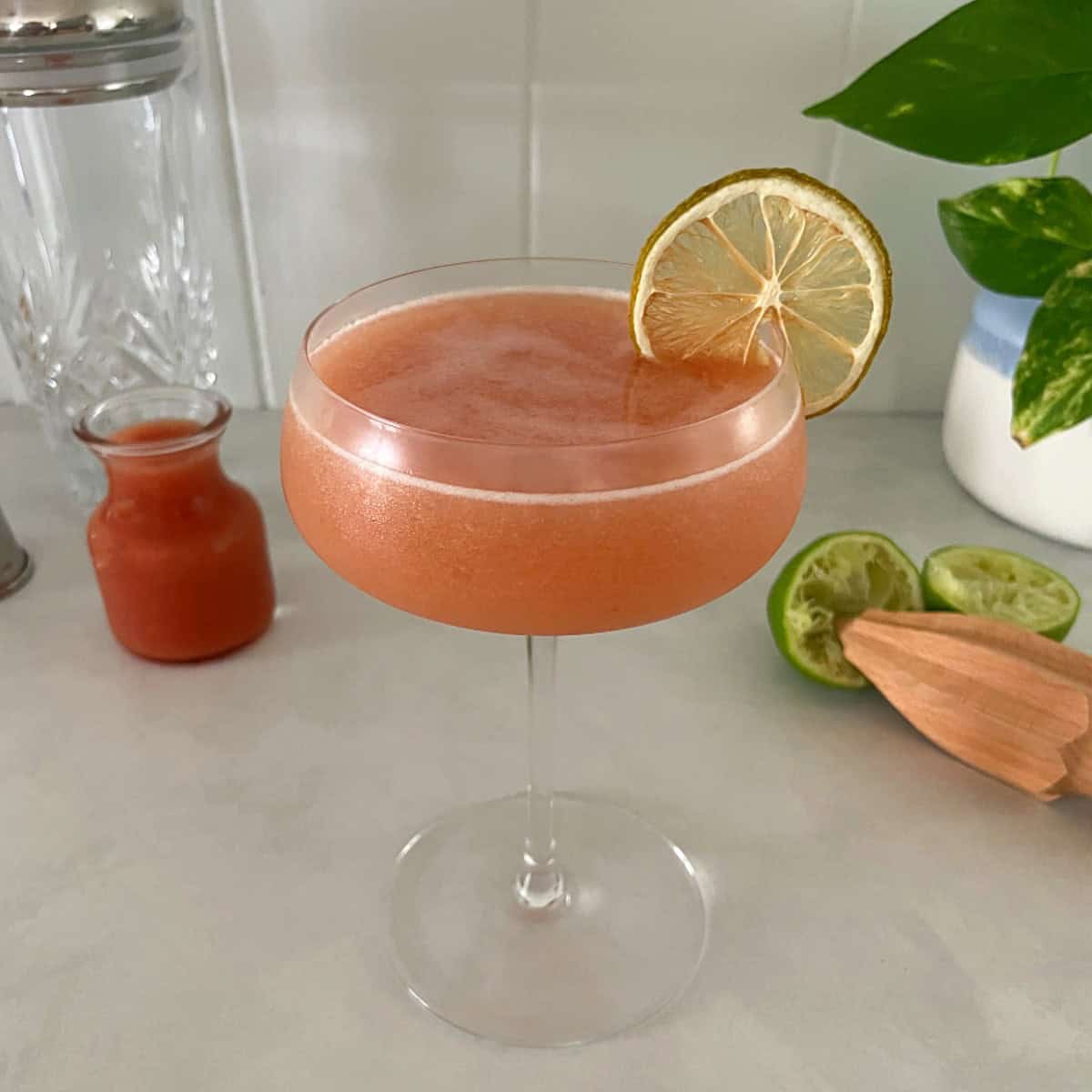 guava daiquiri in a coupe glass.
