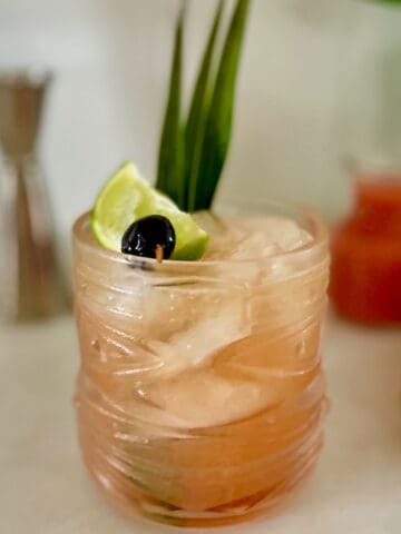 guava mai tai in a viski tiki glass.