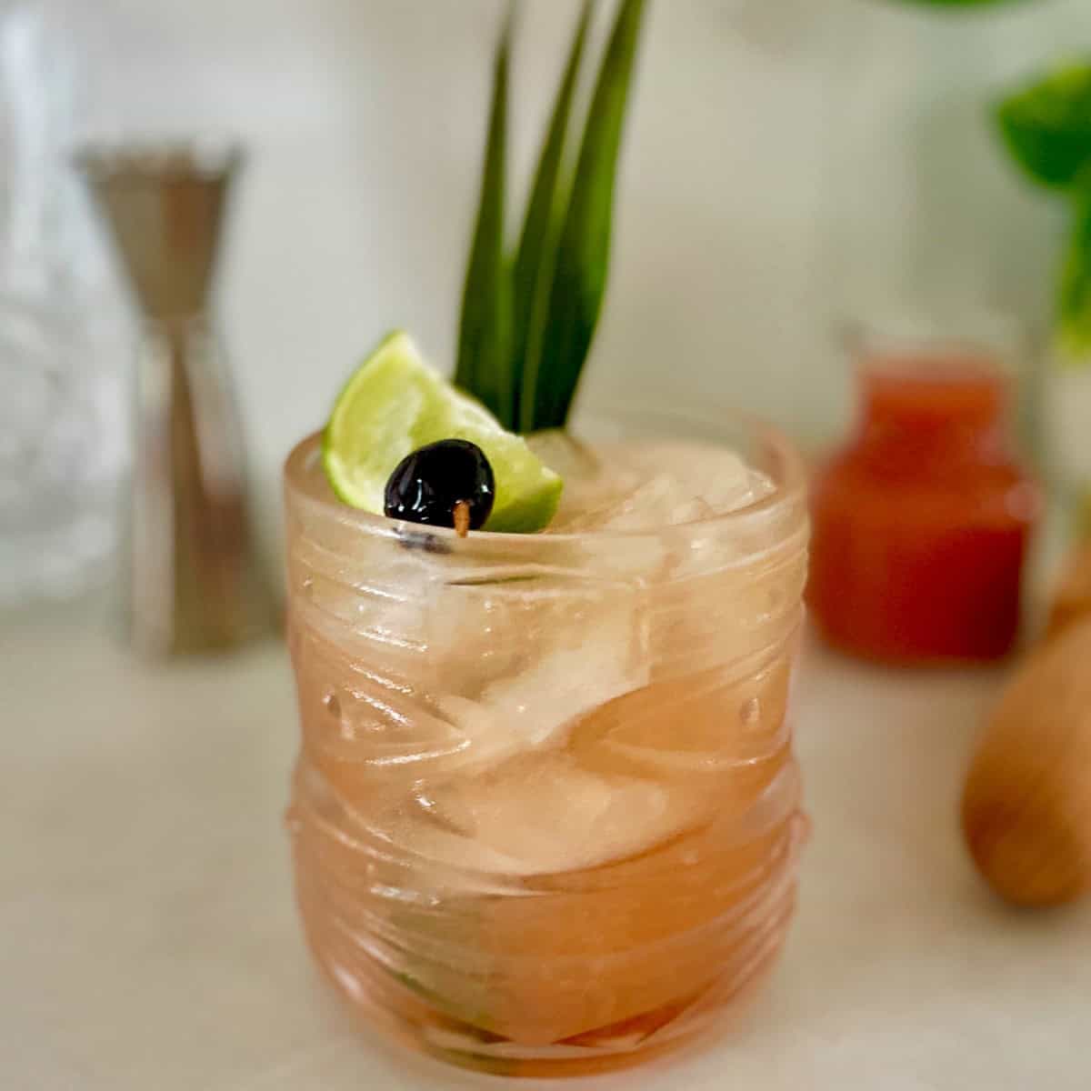 guava mai tai in a viski tiki glass.
