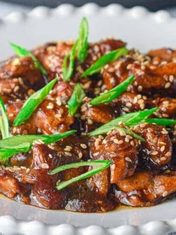 chicken teriyaki in a white plate