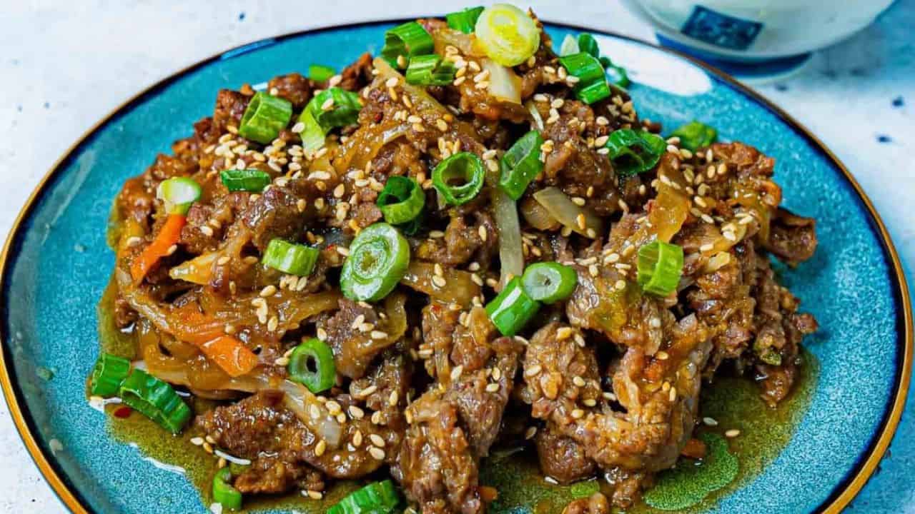 Korean beef bulgogi in a blue plate