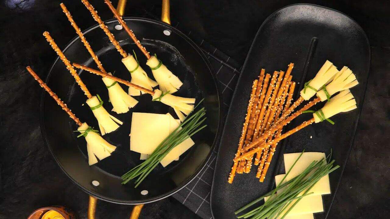 Halloween Cheesy Pretzel Broomsticks