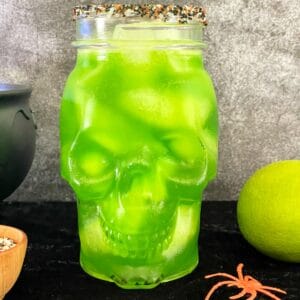 green martini in a skull glass.