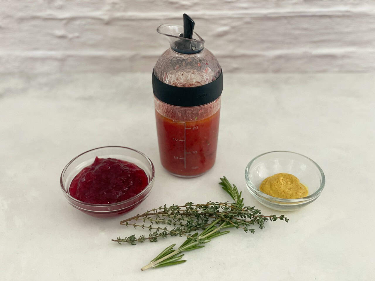 cranberry salad dressing in a dressing container.