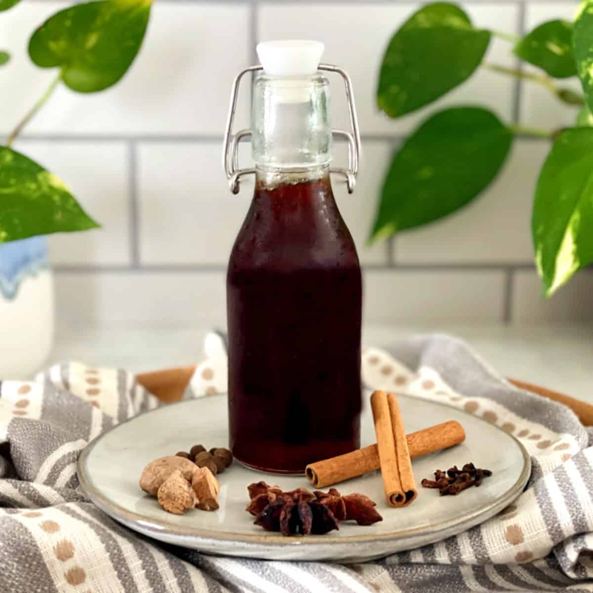 Homemade spiced simple syrup with cinnamon, nutmeg, clove and star anise