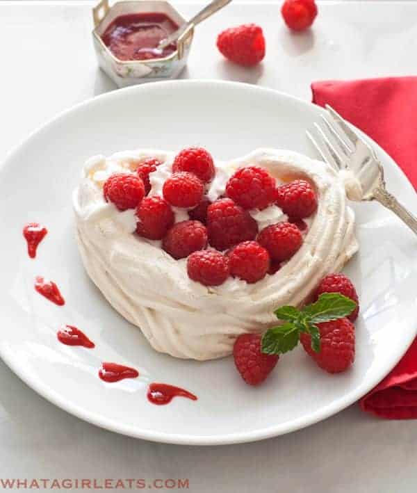 Meringue Hearts with Whipped Cream and Raspberries