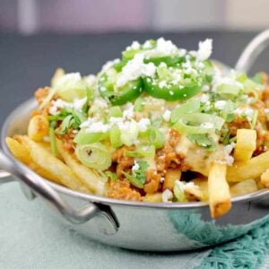 Mexican Poutine with Smoked Cheddar Chile Queso